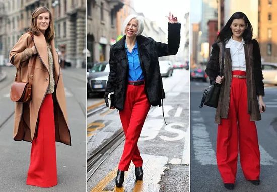 Девушки в пальто и красных брюках