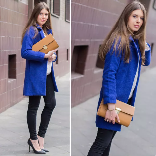 Девушка в коротком синем пальто и с рыжей сумкой