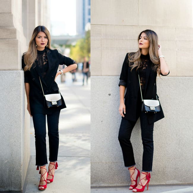 Девушка в укороченных джинсах, гипюровая блузка и черный блейзер