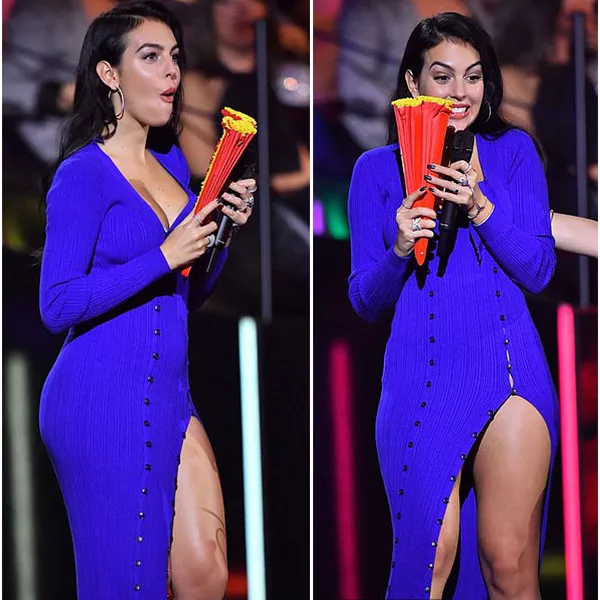 Жоржина Родригес в шикарном синем платье с разрезом и пуговицами