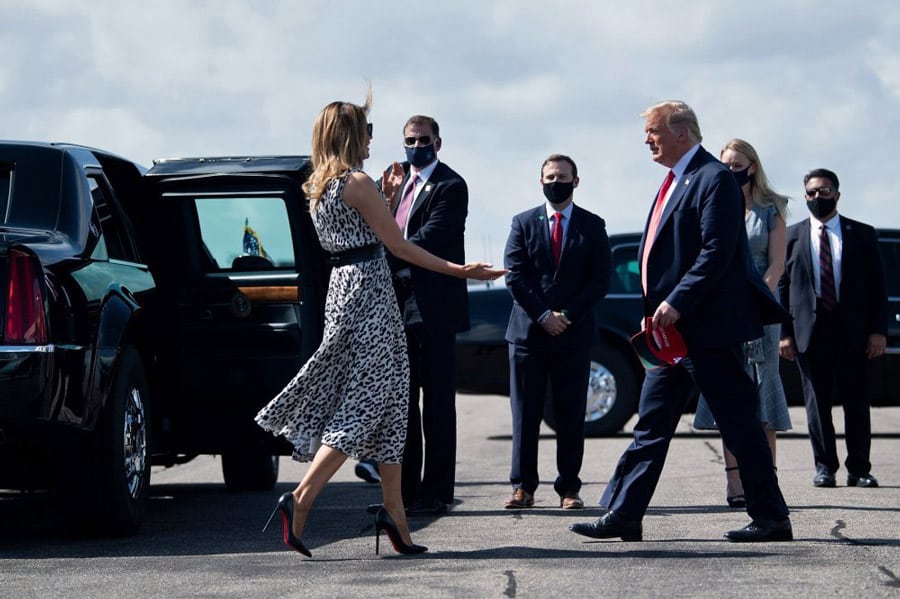 Мелания Трамп в платье с принтом гепарда и лабутенах