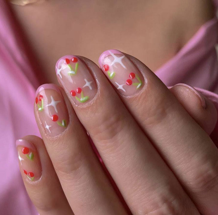 Розовый френч с фруктовым принтом на овальных ухоженных ногтях