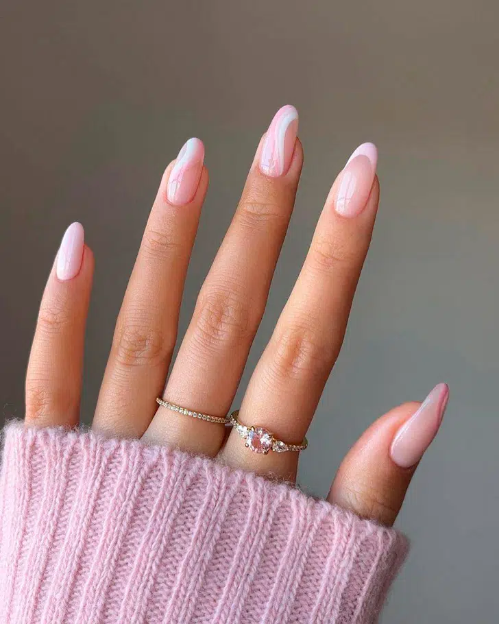 Розовый френч с завитками на овальных длинных ногтях